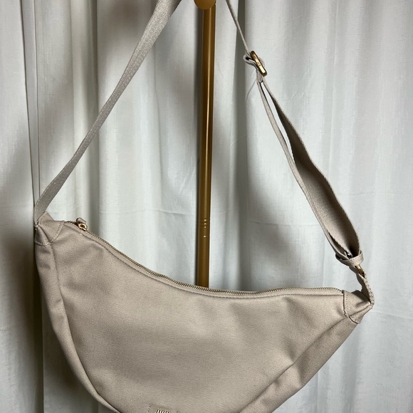 July Crescent Cream Canvas Shoulder Bag Purse Tote with Gold Tag